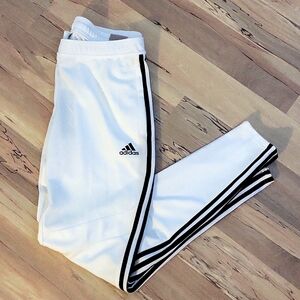 White and black Adidas track suit